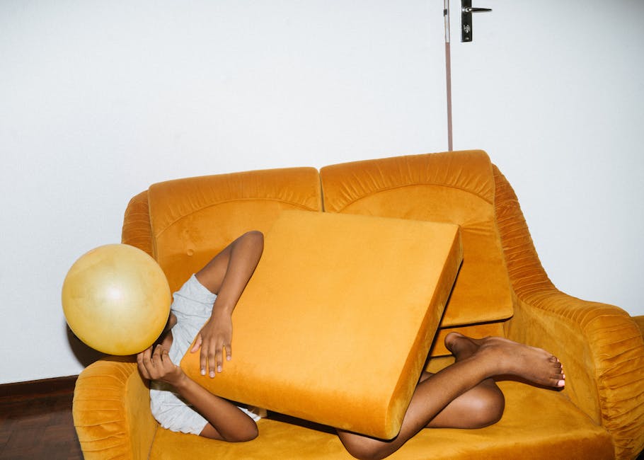 A person stretching gently in a bright and cozy living room